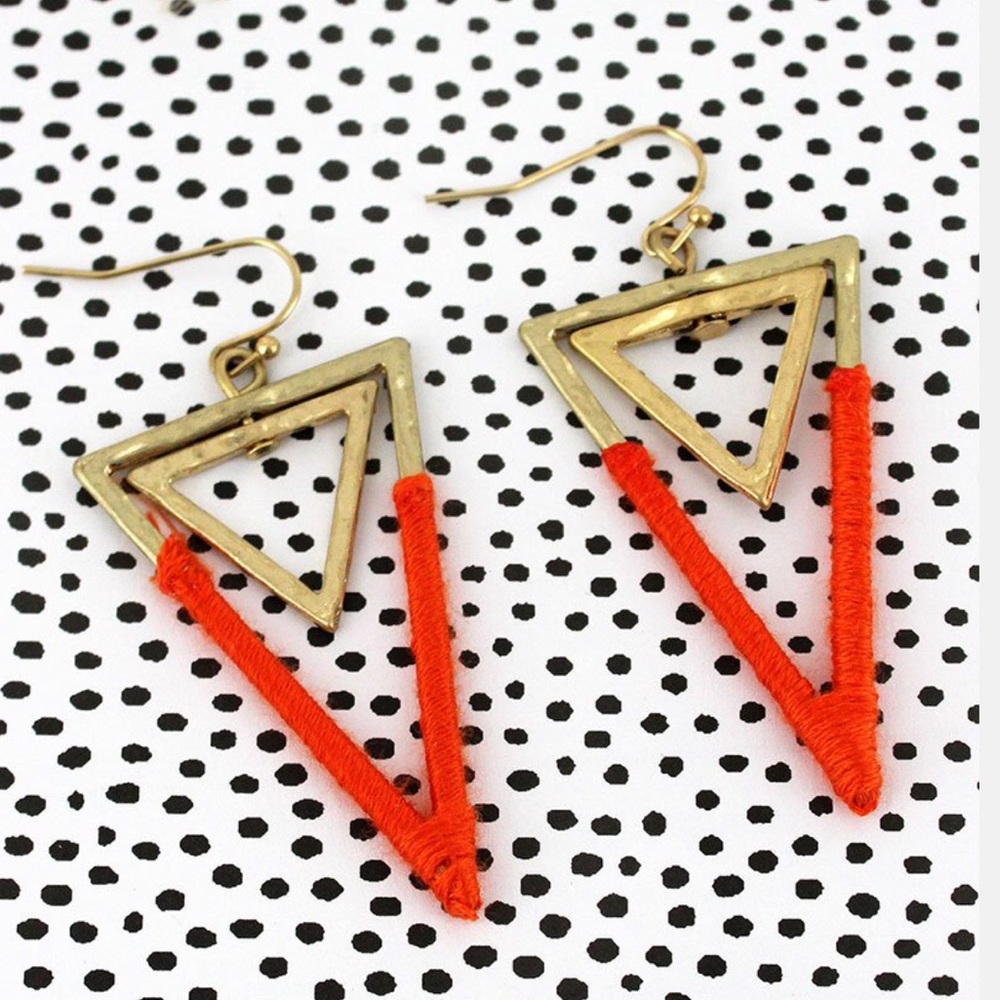 Worn gold, orange thread wrapped earrings